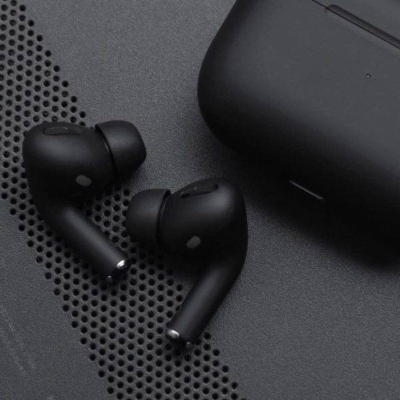 Close-up of black wireless earbuds showing ergonomic in-ear design