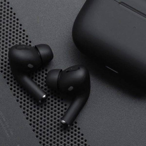 Close-up of black wireless earbuds showing ergonomic in-ear design